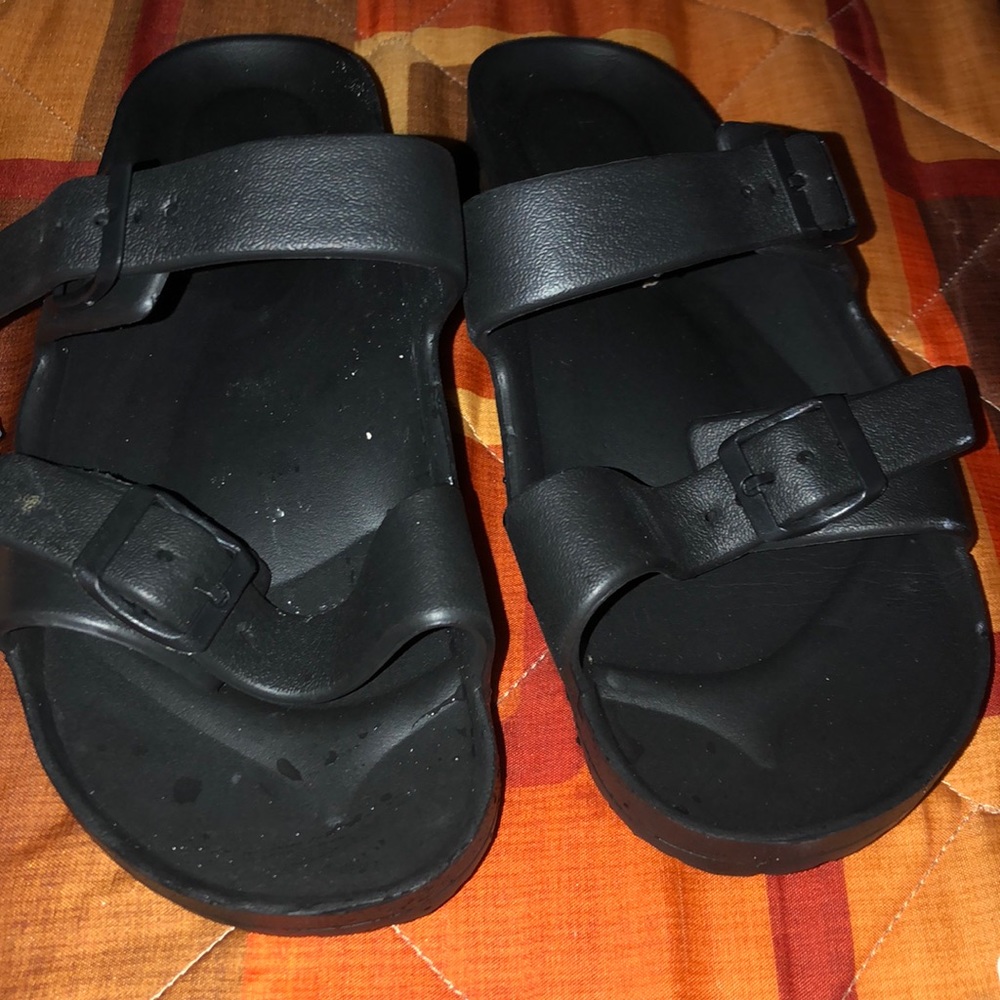 Selling sandals. They’re comfortable.